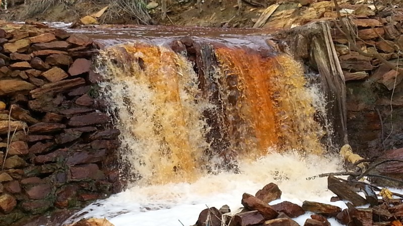 A contaminated creek in Rapu Rapu makes its way to the ocean. (Source: Kalikasan People's Network for the Environment)